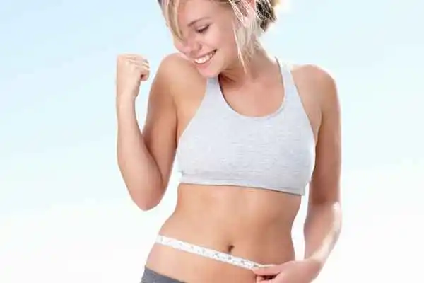 woman happy after fat reduction treatment East Kilbride
